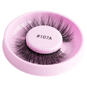 Close-up of black glue-free false eyelashes style #107A in a pink round tray