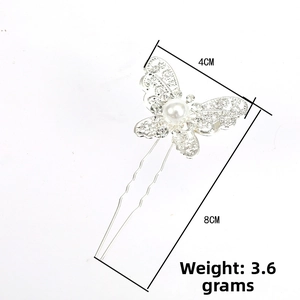 Detail view of rhinestone butterfly hair pin with measurements 8cm length and 4cm width