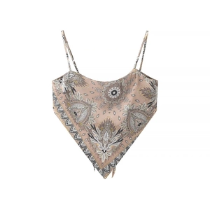 Close-up of vintage totem print camisole with thin straps and V-shaped hemline