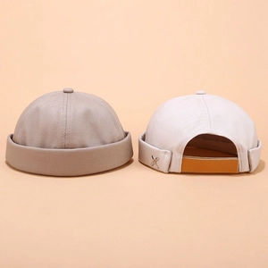 Unisex canvas docker hats with adjustable leather straps and metal X detail