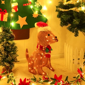 Detailed view of Dachshund Christmas figure with warm LED lights and cozy red scarf