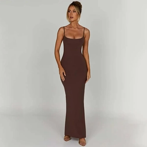 Detailed view of the sleek backless design and slim fit on a brown maxi slip dress