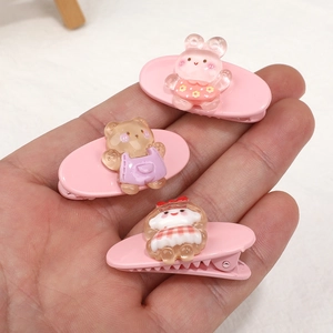 Set of 3 pink cartoon hair clips featuring cute rabbit, bear, and girl designs for kids