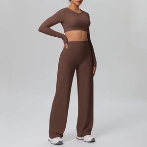 Close-up of high-waist wide-leg track pants and cropped long-sleeve top in coffee brown