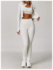 Three-piece set with sports jacket, bra, and high-waisted yoga pants in cream white