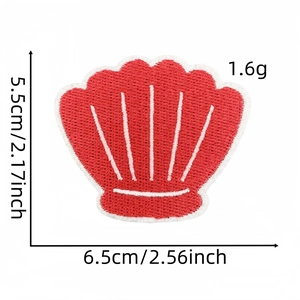 Detailed embroidery of a red shell patch with white stitching for summer apparel DIY
