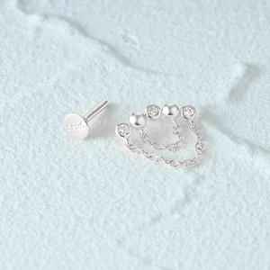 Detail shot of S925 sterling silver ear stud with tassel and clear zircon stones