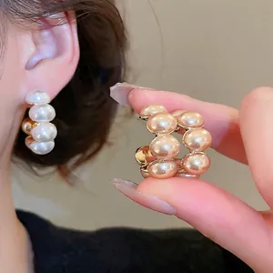 French vintage gold plated C-shaped pearl earrings in white and champagne gold styles