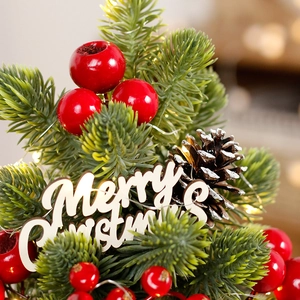 Mini LED Christmas tree with pine cones, red berries and Merry Christmas wooden sign