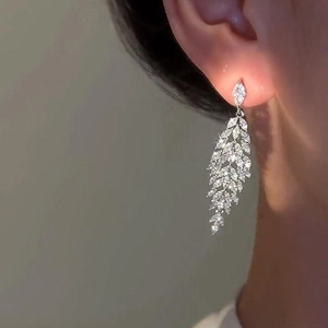 Silver leaf tassel earrings with sparkling zircon crystals for a minimalist elegant look