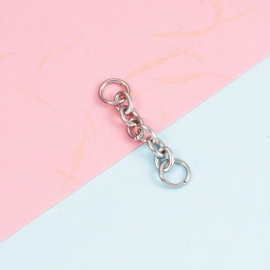 Detail of silver stainless steel extender chain with double open jump rings for DIY jewelry