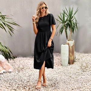 Short sleeve waist-cinching midi dress in black with pleated bodice and tiered ruffle hem