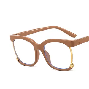 Stylish square blue light blocking glasses with brown frames and gold metal accents