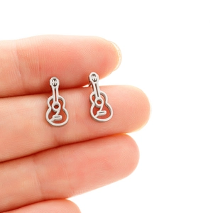 Detailed view of miniature hollow guitar stud earrings in polished silver finish