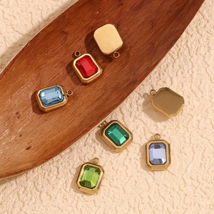 Detail of multi-color rectangular gemstone pendants with 18K gold plated frames