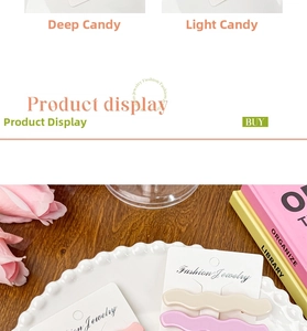 Detailed view of wave acetate hair clips in macaron colors on branded card packaging