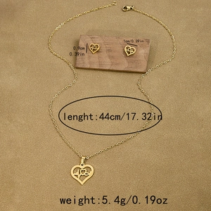 Detail of heart pendant set with ECG pattern and matching earrings with dimensions