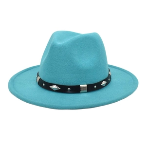 Detail of teal wool fedora hat featuring black faux leather belt and silver metal studs