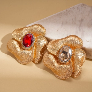 Vintage gold floral earrings with red and champagne crystals and shimmering rhinestones
