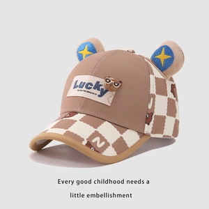 Detailed view of kids' bear baseball cap featuring checkerboard pattern and cute 3D blue ears