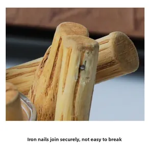 Macro detail of driftwood candle holder showing reinforced nail joints for durability