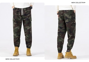 Detail of men's camouflage cargo pants showing drawstring waist and large side pockets