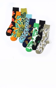 Detailed flat lay of 7-pack cotton socks featuring colorful maple leaf and plant prints