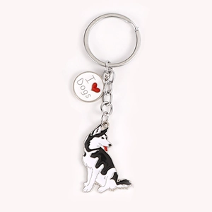 Detailed view of metal husky keychain with I love Dogs charm and polished finish