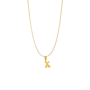 Detailed macro view of the gold letter X pendant on a fine snake chain necklace