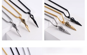 Detail view of retro 18K gold plated vajra pendants in silver, gold, and black finishes