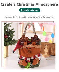 Detailed view of 3D reindeer Christmas gift bag with a green felt finish and scarf