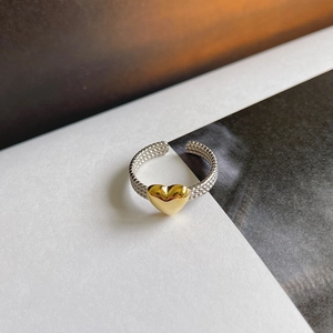 Elegant silver twisted texture open ring with a gold heart center decoration for women