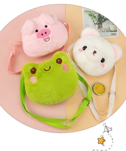Flat lay of cute plush coin purses in pig, frog and bear shapes on soft background