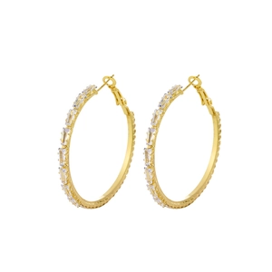 Luxury gold hoop earrings with baguette-cut sparkling cubic zirconia on white background
