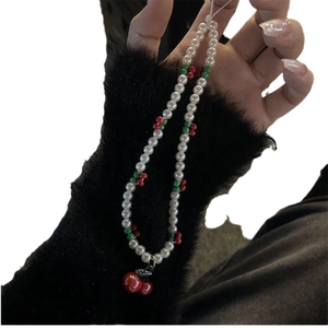 Handmade cherry bead phone lanyard with white pearls and red bow for bags and accessories