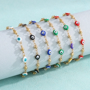 Gold evil eye bracelet set with multi-colored enamel beads in six vibrant color options