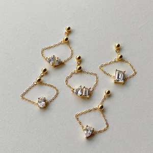 Adjustable gold chain rings with various shaped cubic zirconia teardrop and heart gems