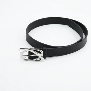 Detail of a black leather belt with a smooth silver metallic buckle on a white background