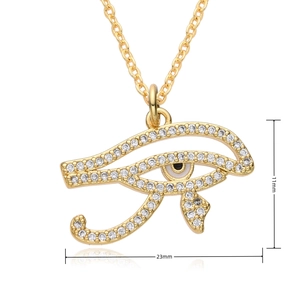 Macro view of gold Horus Eye pendant with white zircons showing 23mm by 11mm dimensions