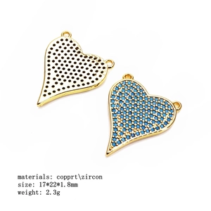 Front and back view of heart pendant with blue zircon micro-pave and copper base