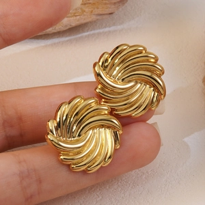 Elegant gold swirl stud earrings in vintage French style made of durable titanium steel