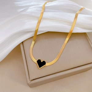 Golden titanium steel snake chain necklace featuring a black heart-shaped pendant with beads