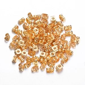 Detailed pile of bulk golden butterfly earring backs made of premium stainless steel
