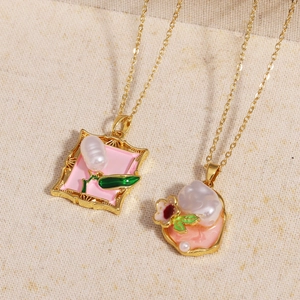 Detail view of oil painting style enamel flower pendants with freshwater pearls