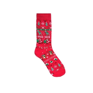 Detailed knit texture of red Christmas socks featuring festive holiday patterns