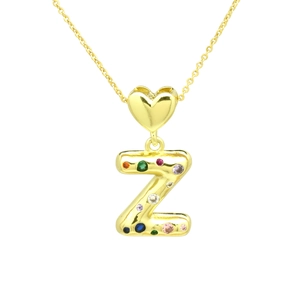 Detailed close-up of gold Z-letter bubble pendant with multi-color zircon stones