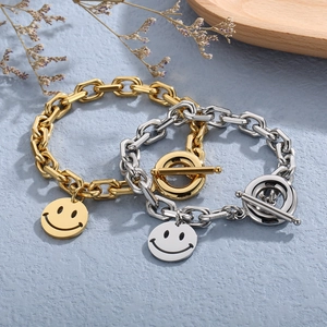 Gold and silver stainless steel link bracelets with smiley charms and OT toggle clasp