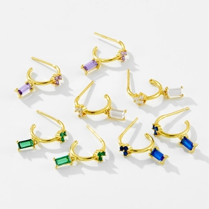 Detail view of gold S925 silver hoop earrings with colorful rectangular zircon stones