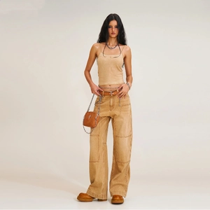Women's vintage khaki camisole with brown wide-leg cargo pants and chain crossbody bag