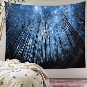 Close-up of starry night forest tapestry hanging on a bedroom wall for room decor